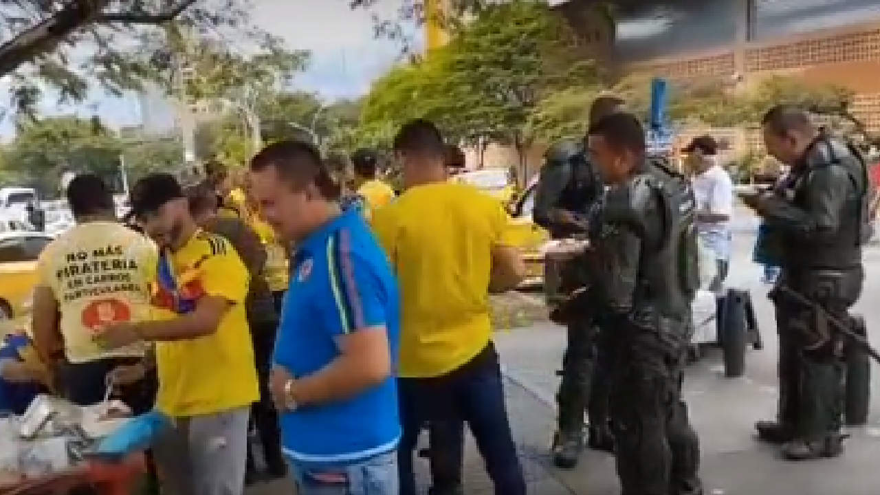 almuerzo taxistas y policias