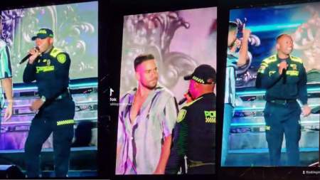 El poli Omar: policía se robó el show cantando con Romeo Santos durante un concierto en Medellín El poli Don Omar: policía cantó con Romeo Santos durante un concierto en Medellín
