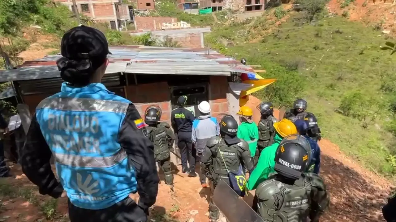 desalojo-laasomadera-disturbios2