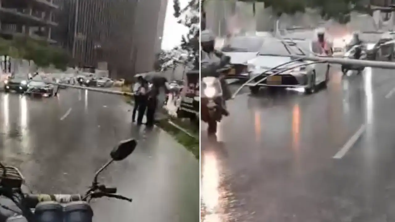 Vehículo derriba poste que cae sobre otro carro en la Av. Las Palmas