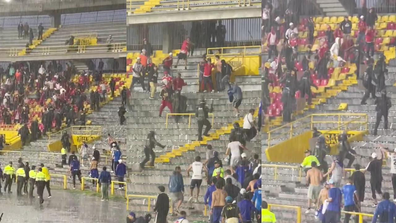 Videos| ¡Ni el agua se los impidió! Hinchas de Millonarios y América protagonizaron peleas en El Campín pelea-tribuna