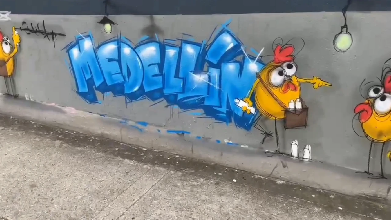 Artista finlandesa, junto a colectivos locales, pintaron uno de los murales más grande de la ciudad de Medellín 2 mural-medellin-artistas-locales-finlandia-centro-comercial-sandiego5