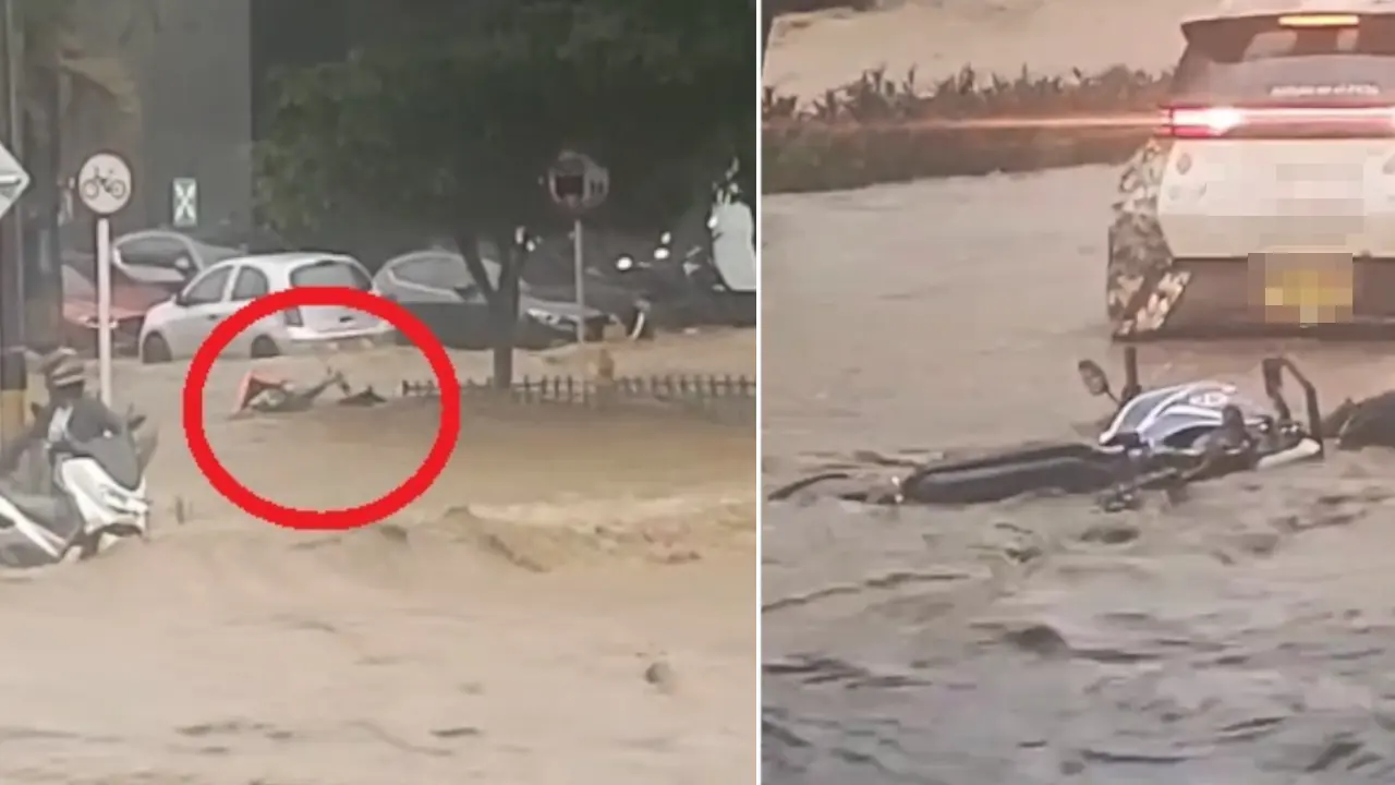 Corriente por lluvias se lleva a domiciliario y motocicleta de tránsito en Medellín